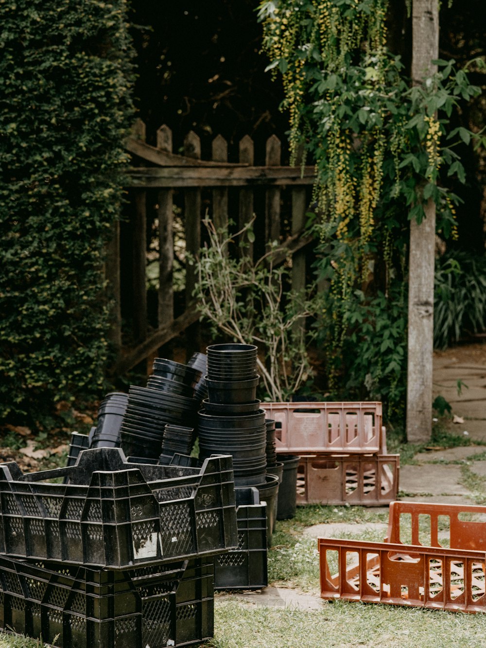 black plastic crate on brown wooden table