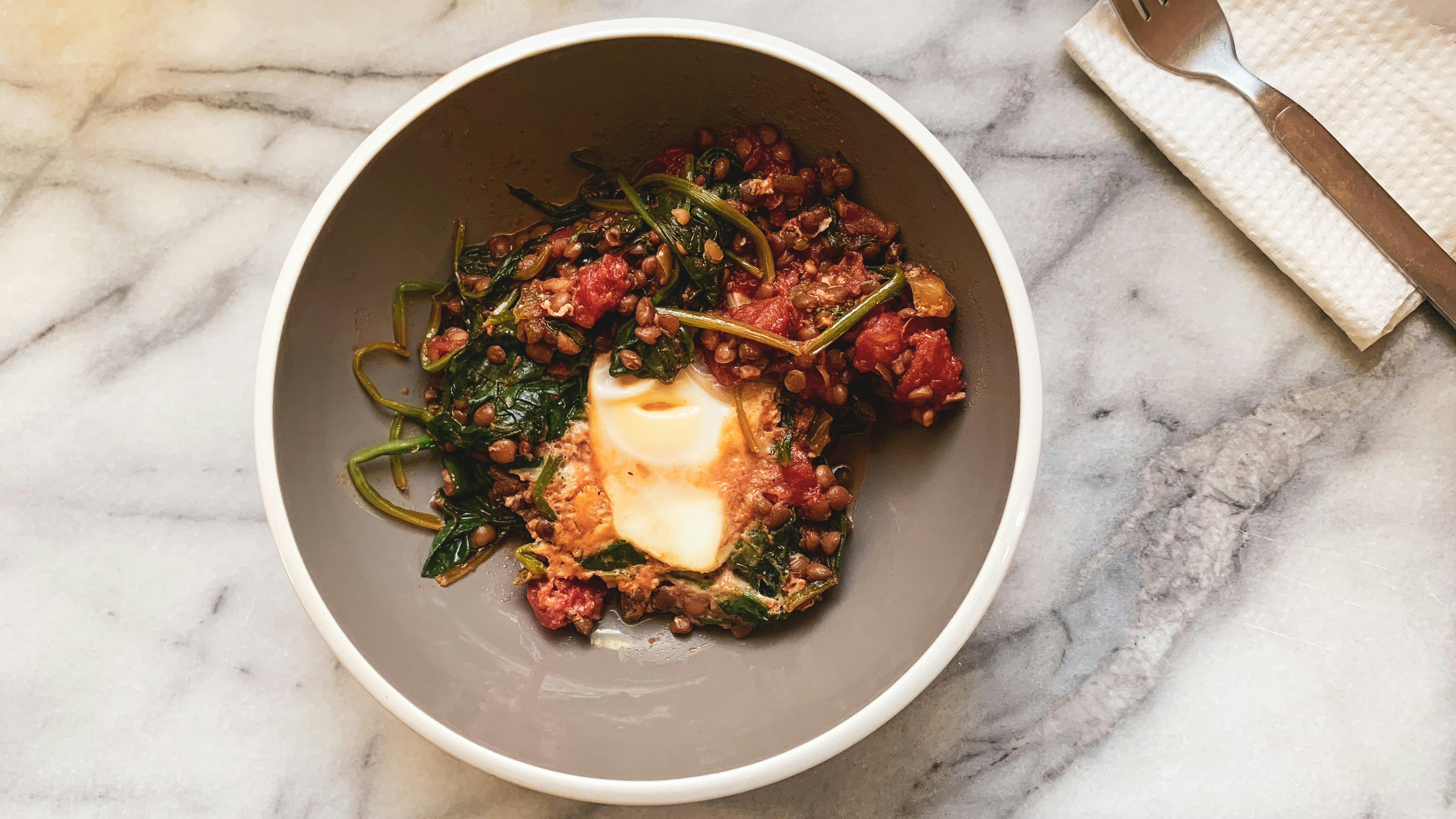 Bowl of lentils and greens
