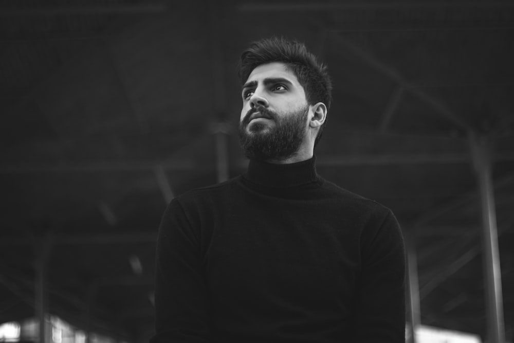 man in black turtleneck sweater