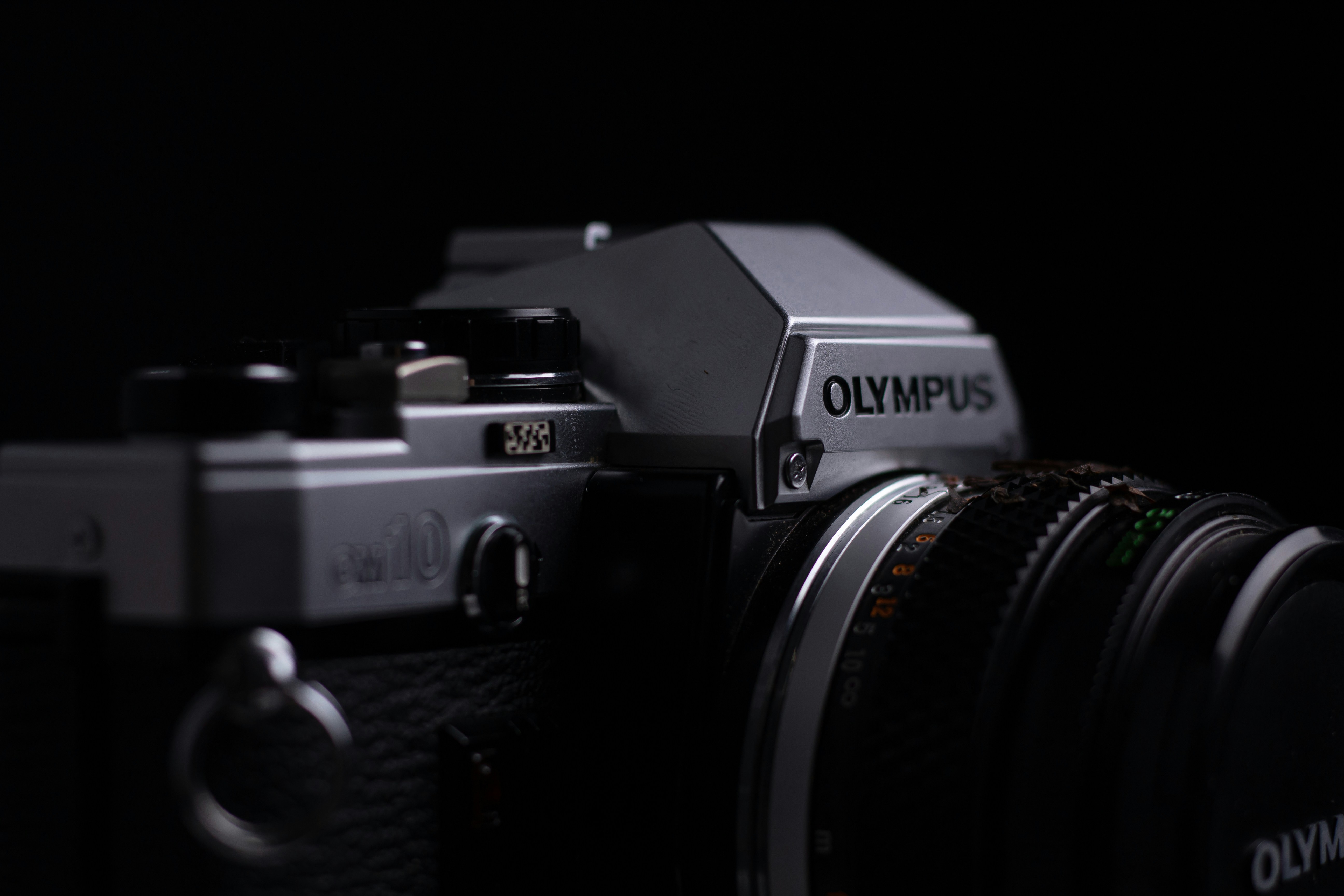 Olympus OM-10 analogue camera studio close up shot. Shot on Canon EOS 1300D w/ 18-55mm f3.5 - 5.6