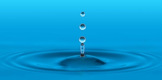 water drop in blue water