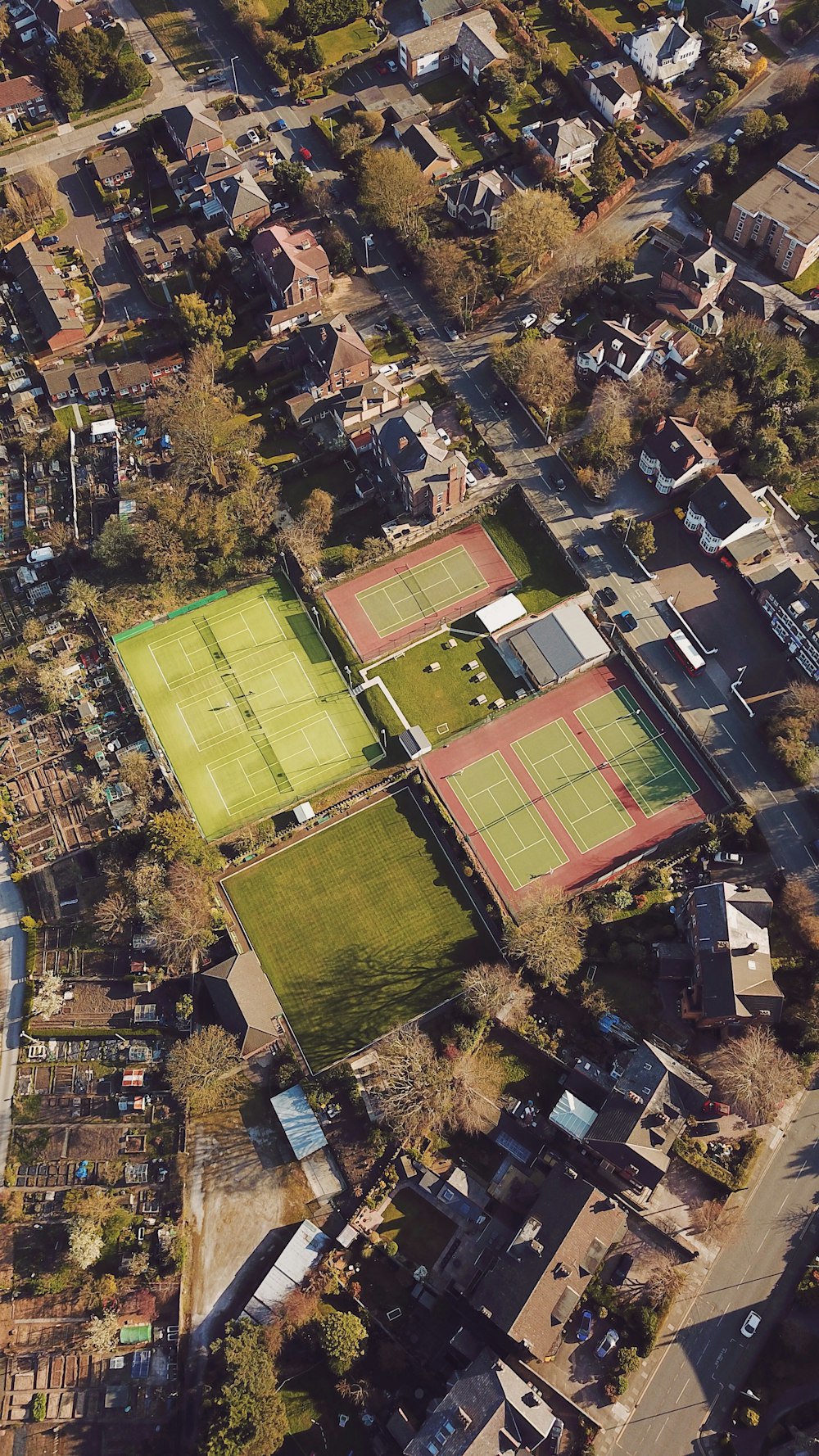 aerial view of green and brown soccer field
