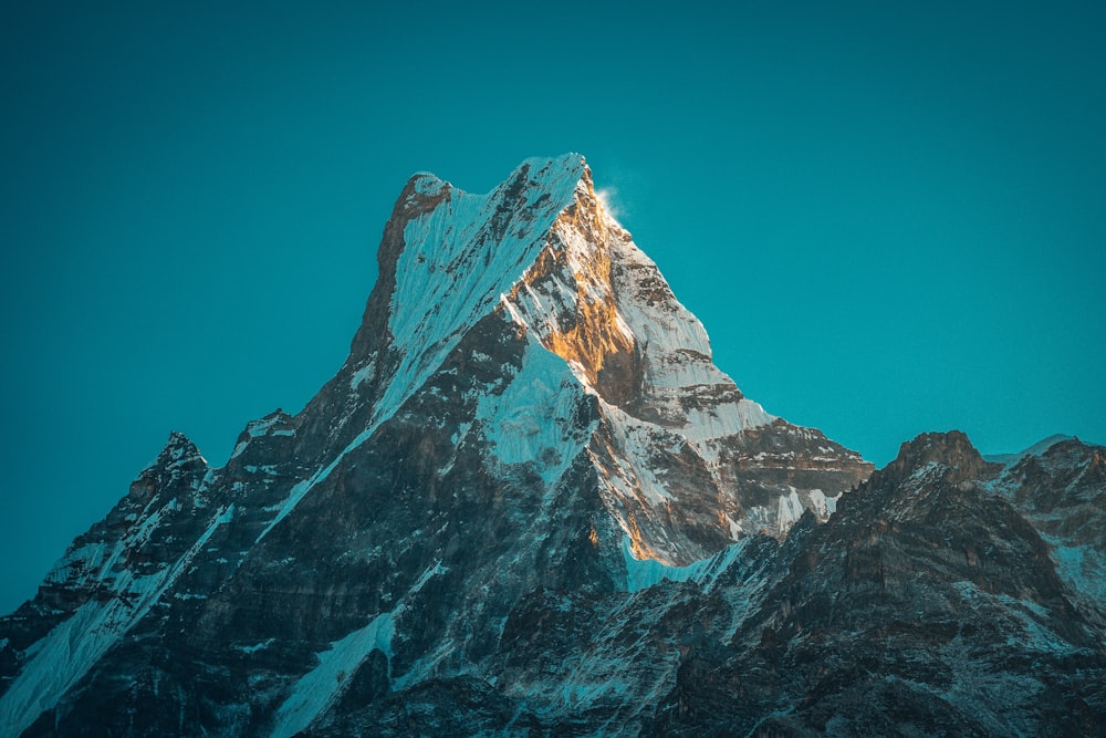 rocky mountain under blue sky during daytime