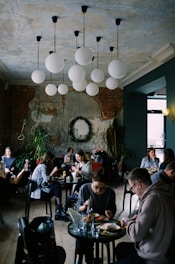 A cozy café interior with customers enjoying their drinks.