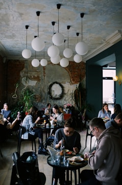 A cozy café interior with customers enjoying their drinks.