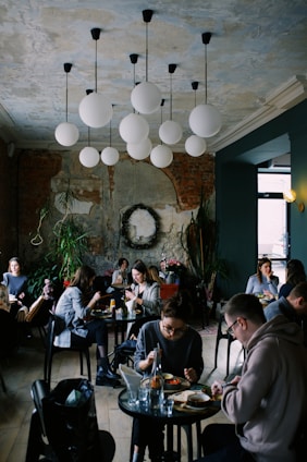A cozy café interior with customers enjoying their drinks.