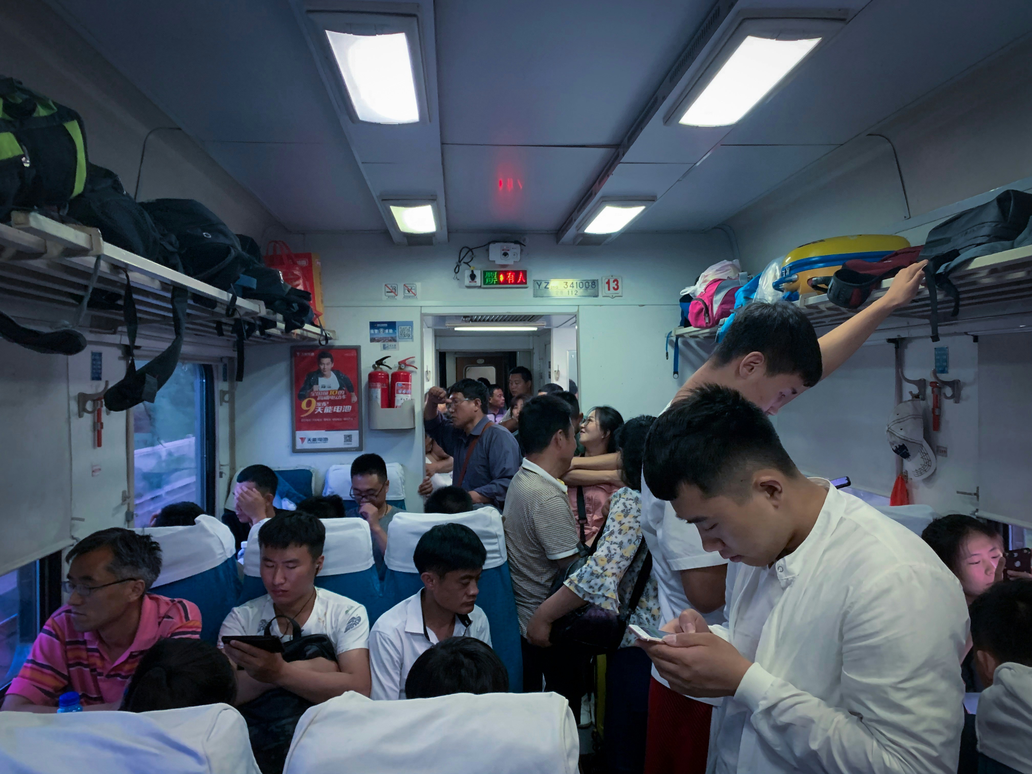 people sitting on chair in front of table