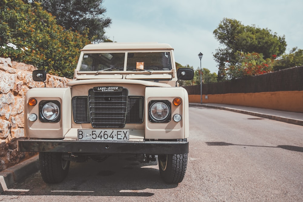 white jeep wrangler on road during daytime