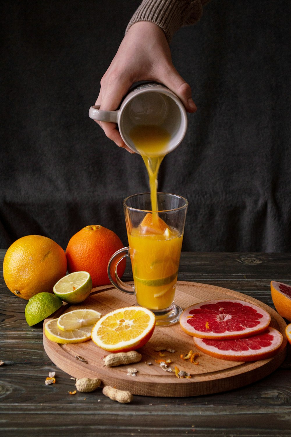 orange juice in clear drinking glass