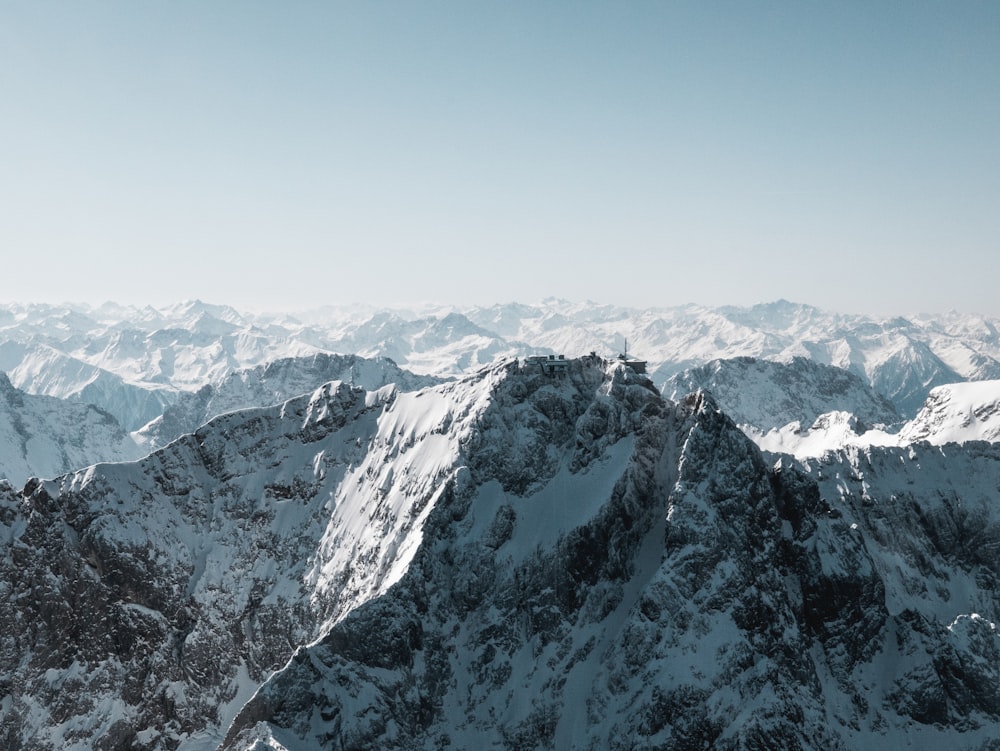 snow covered mountain under blue sky during daytime