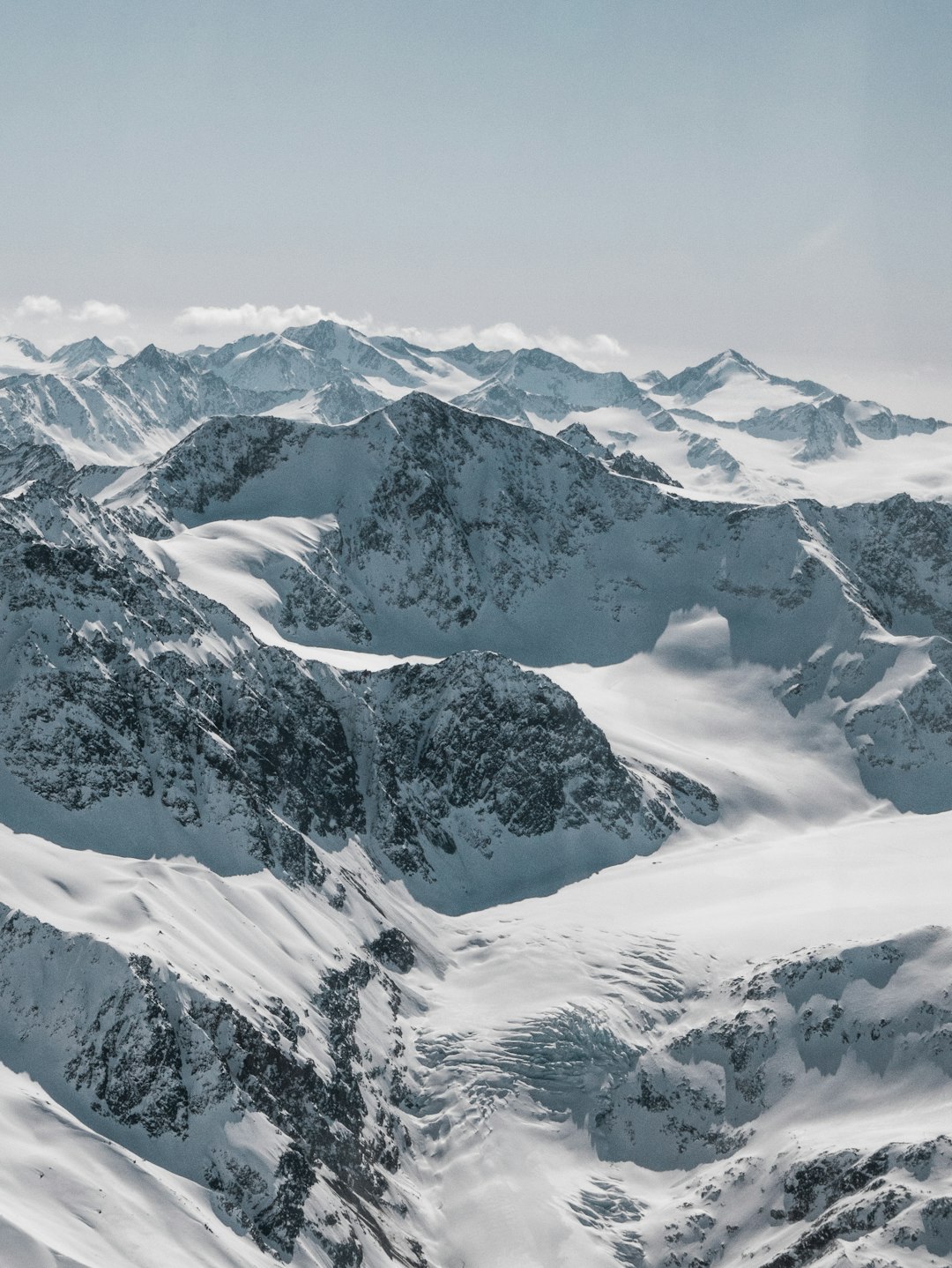 snow covered mountains during daytime