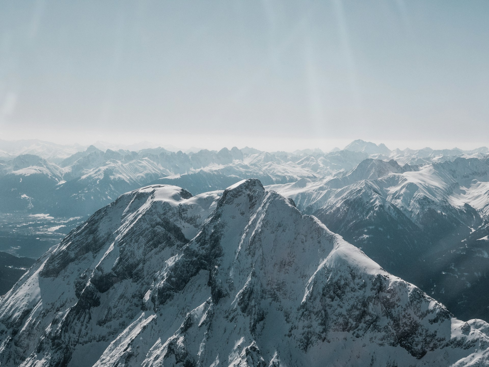 snow covered mountain during daytime