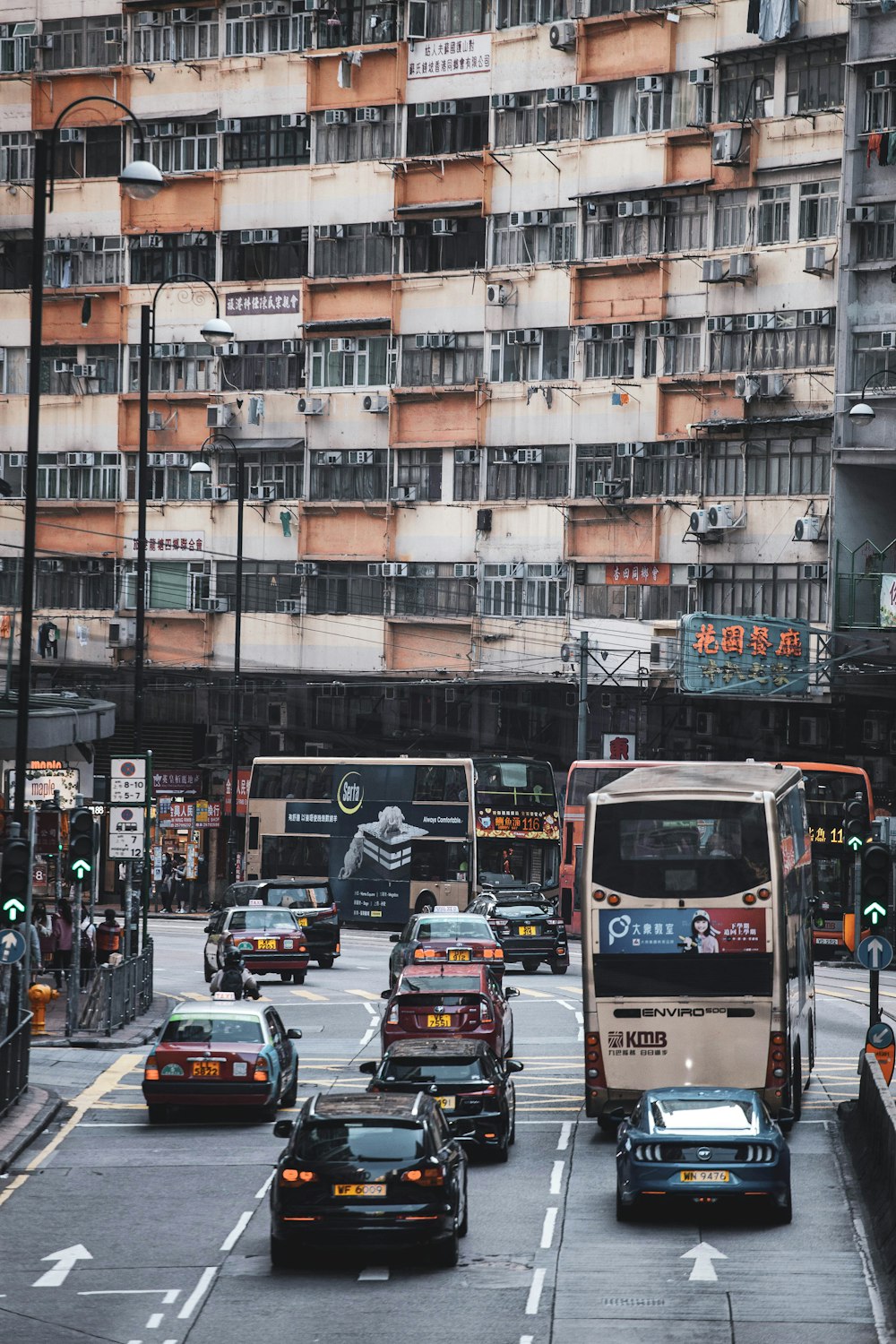 cars on road near building during daytime