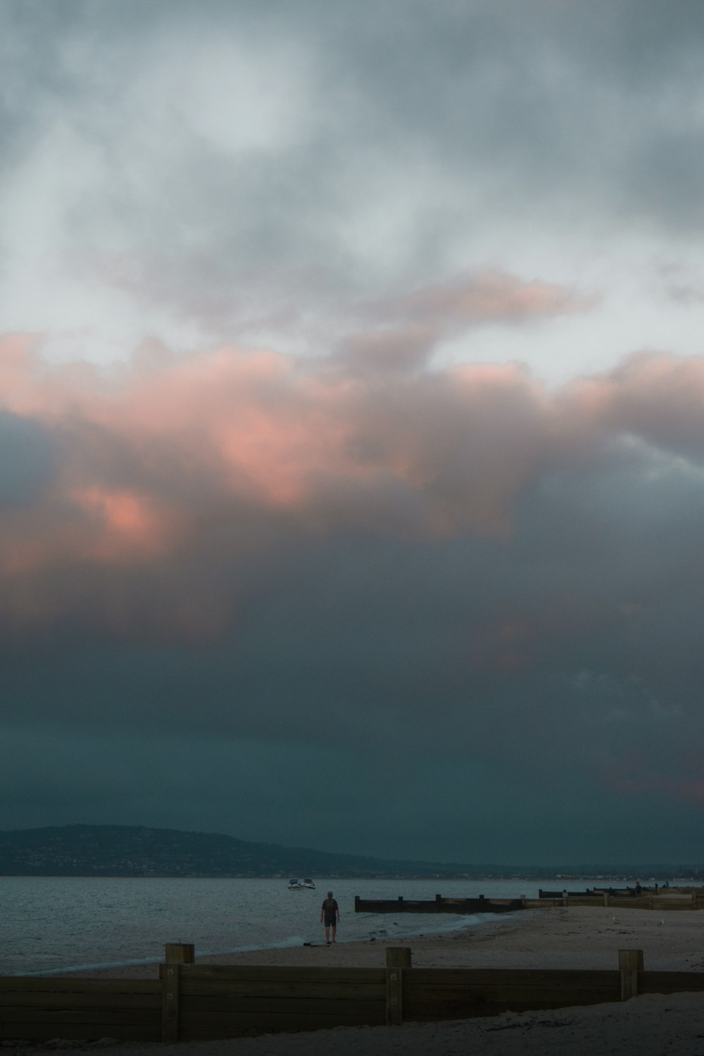 white clouds over mountain during daytime