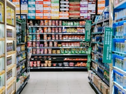assorted labeled boxes on shelf