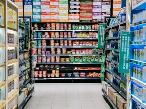 assorted labeled boxes on shelf