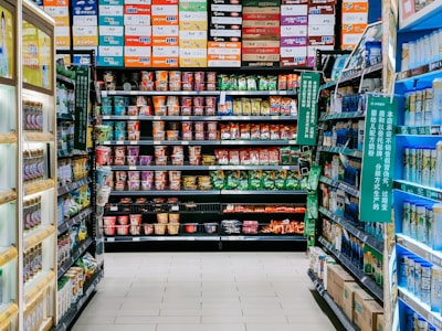 assorted labeled boxes on shelf