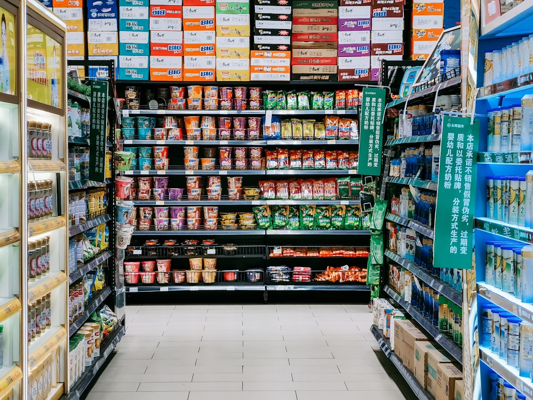 assorted labeled boxes on shelf,