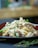 A close-up of a plate of freshly cooked pasta with a light sauce.