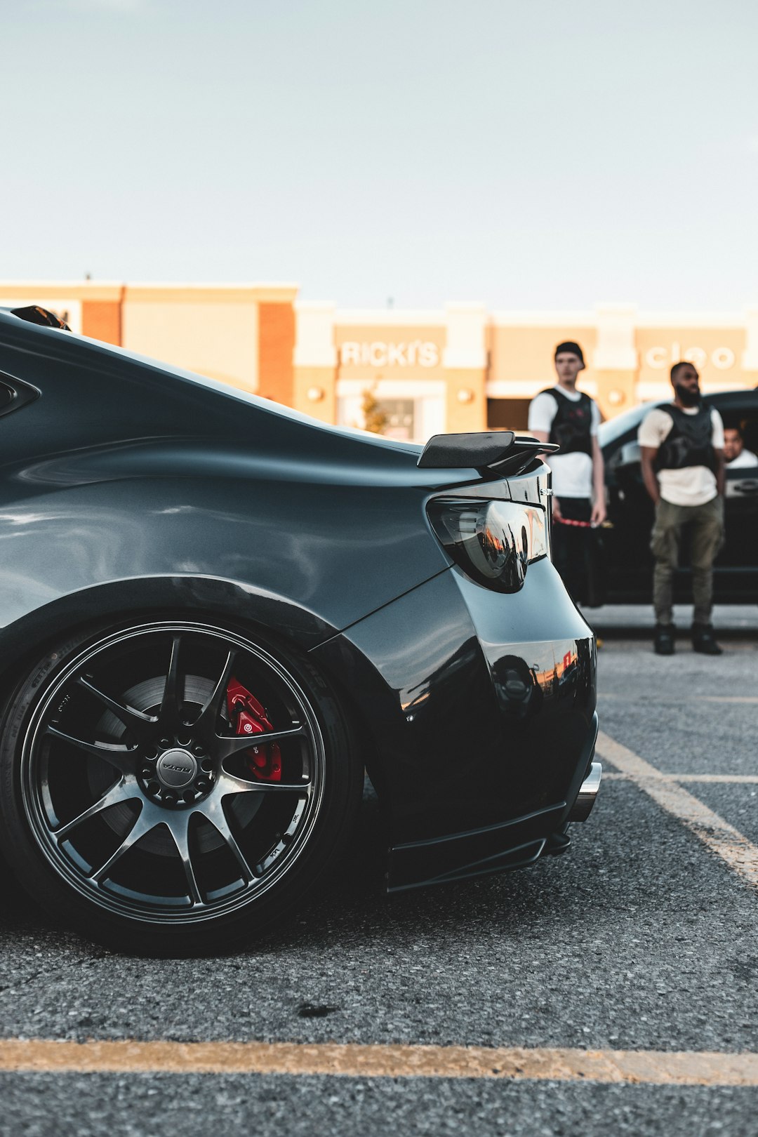 black sports car on road during daytime