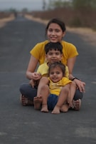 A family receiving support supplies with warm smiles, embodying dignity and hope.
