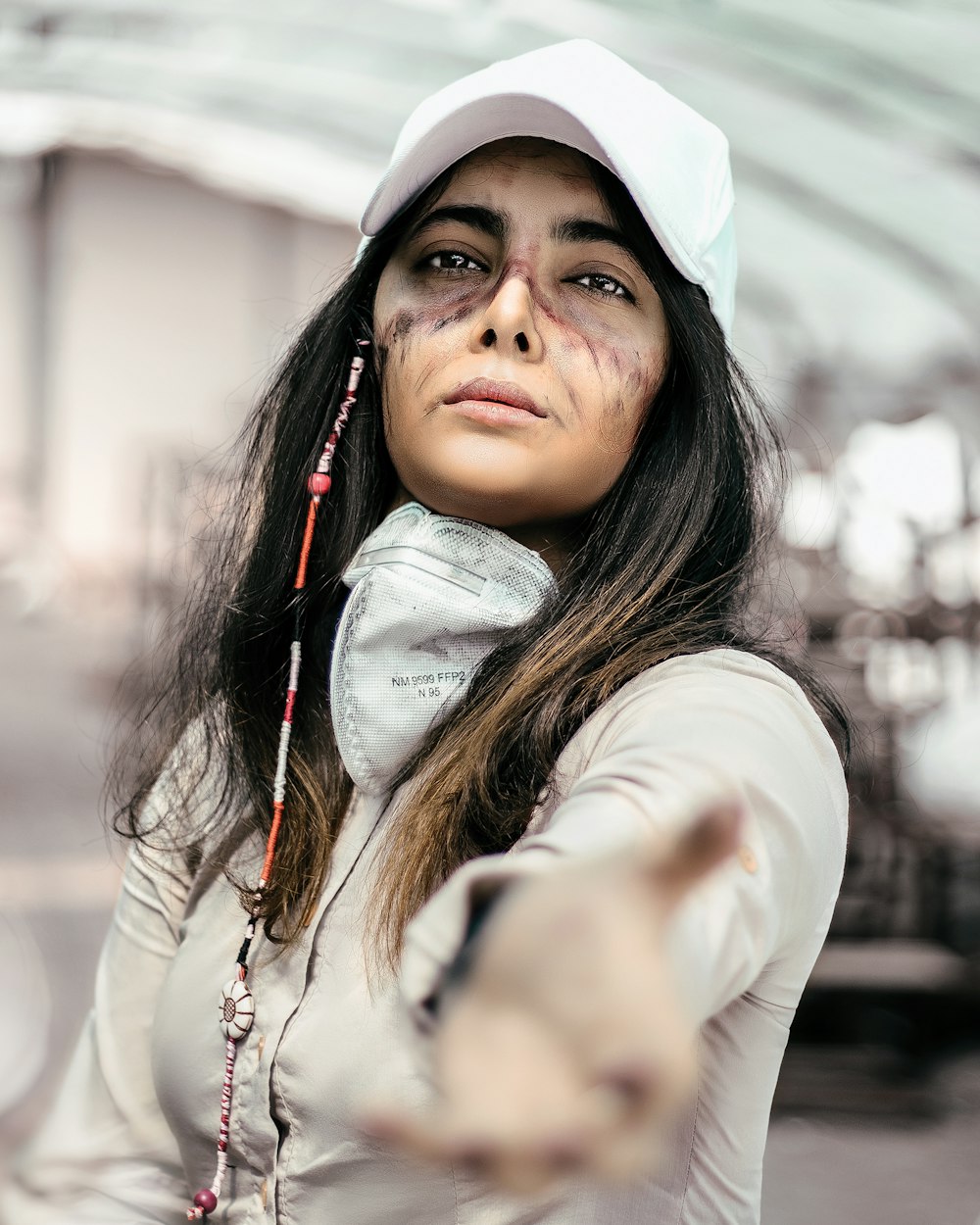 woman in white long sleeve shirt and white cap