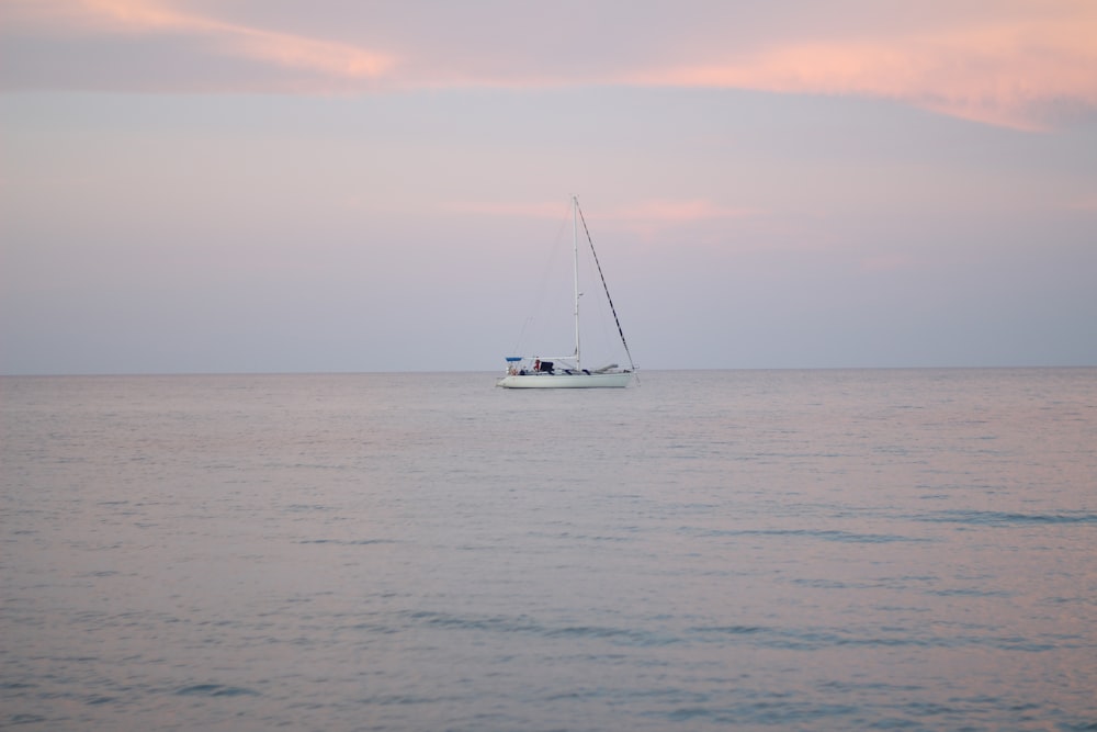 white sailboat on sea during daytime