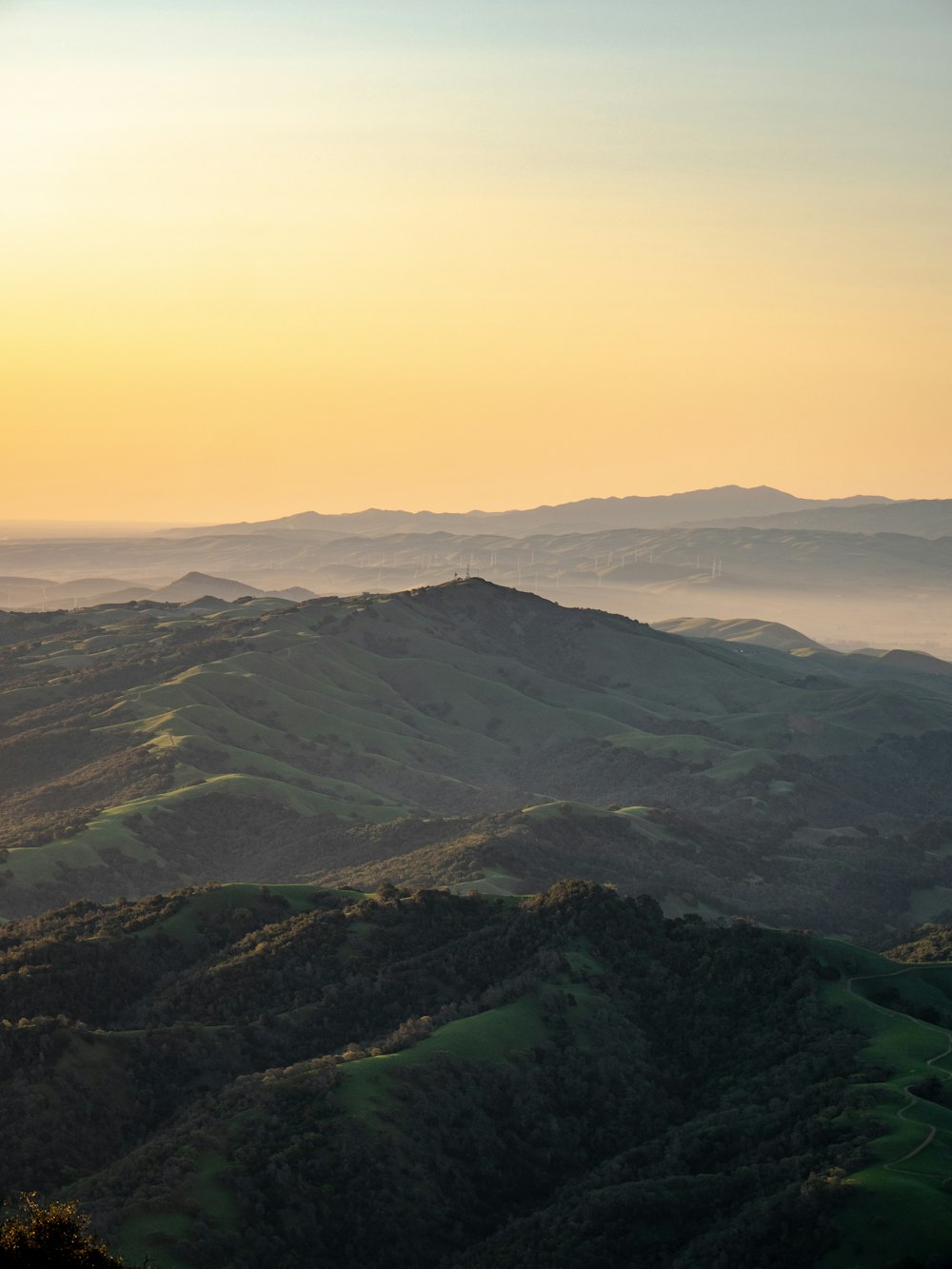 green mountains under white sky during daytime