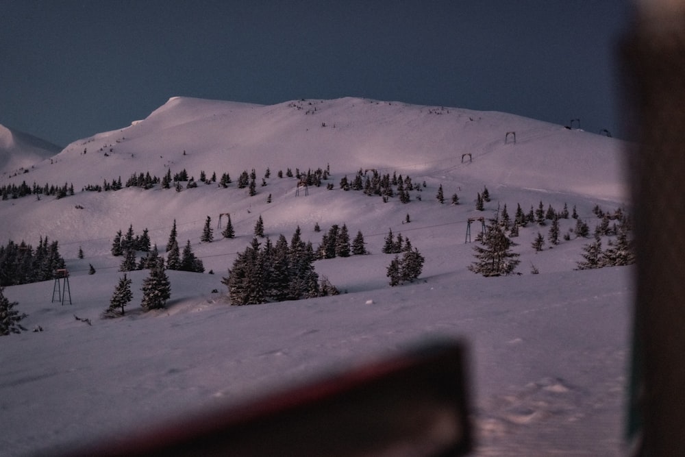 snow covered mountain during daytime