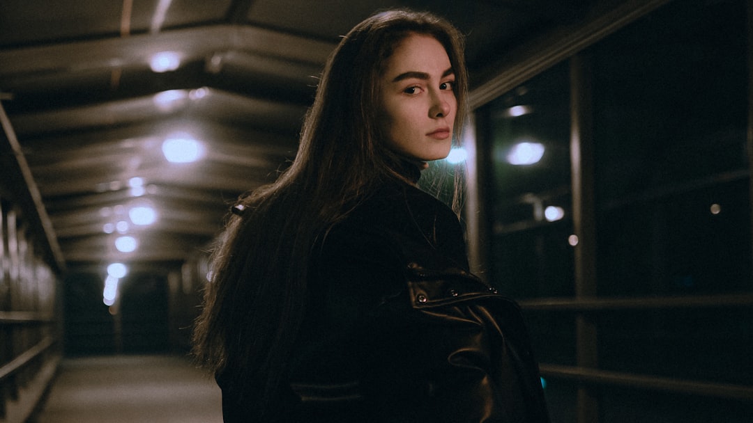 woman in black leather jacket