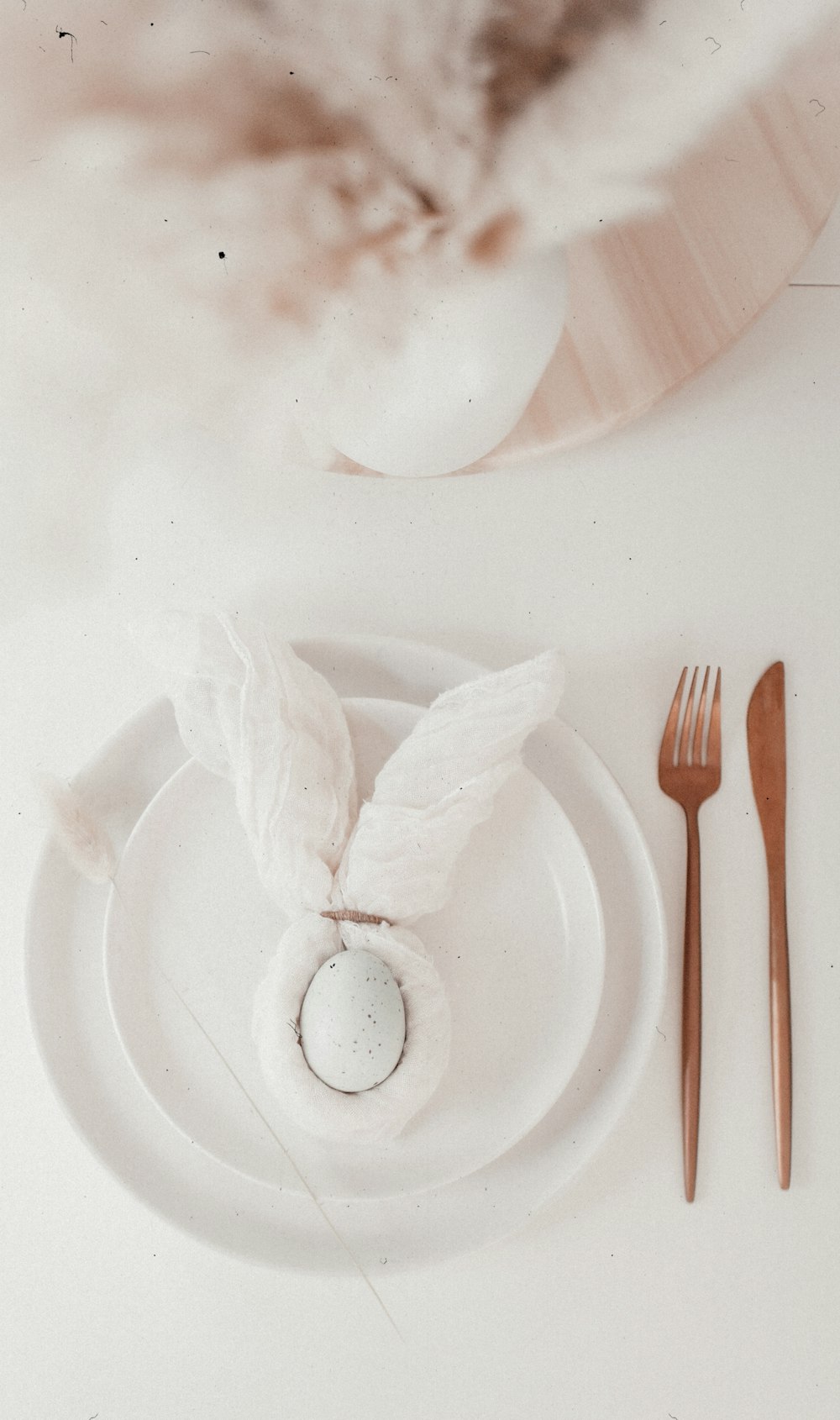 white ceramic plate with fork and knife