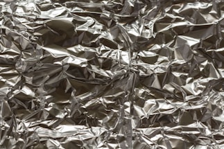 white and gray floral textile