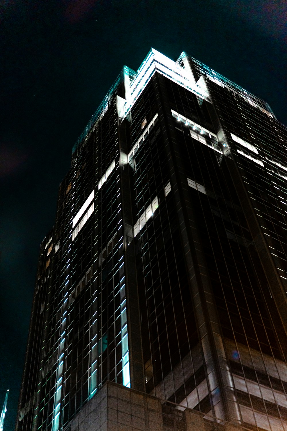 gray concrete building during night time