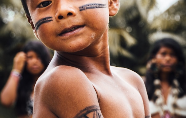 topless boy with black hair