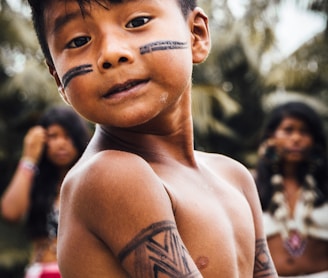 topless boy with black hair