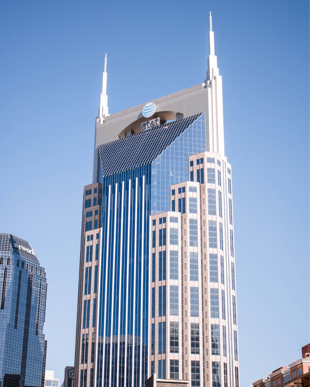 white and gray high rise building