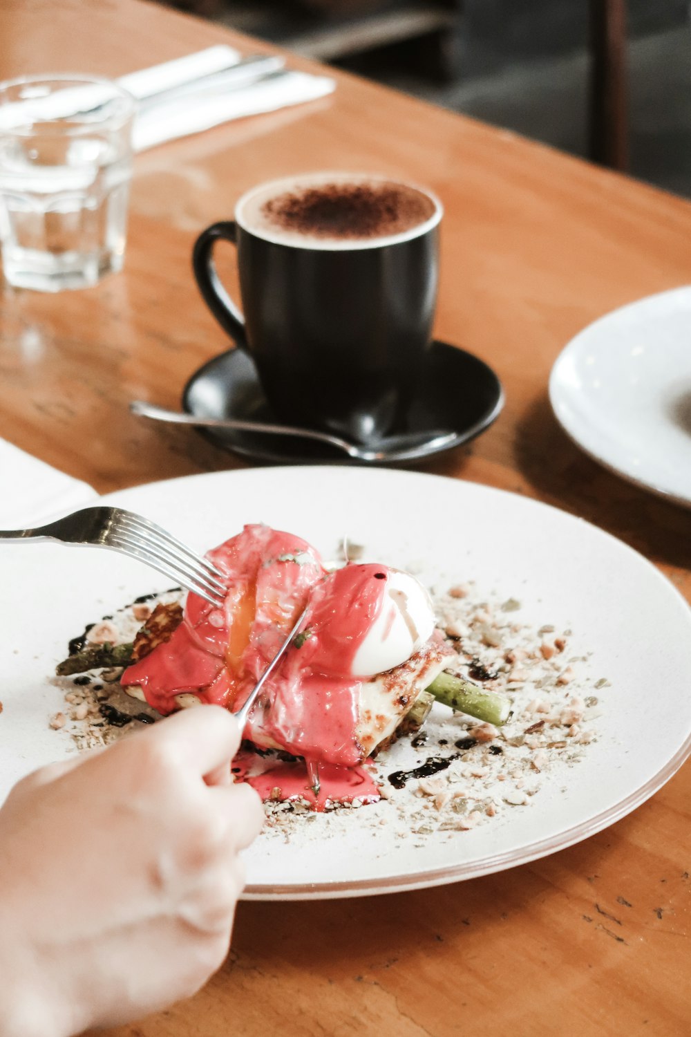 sliced strawberry on white ceramic plate