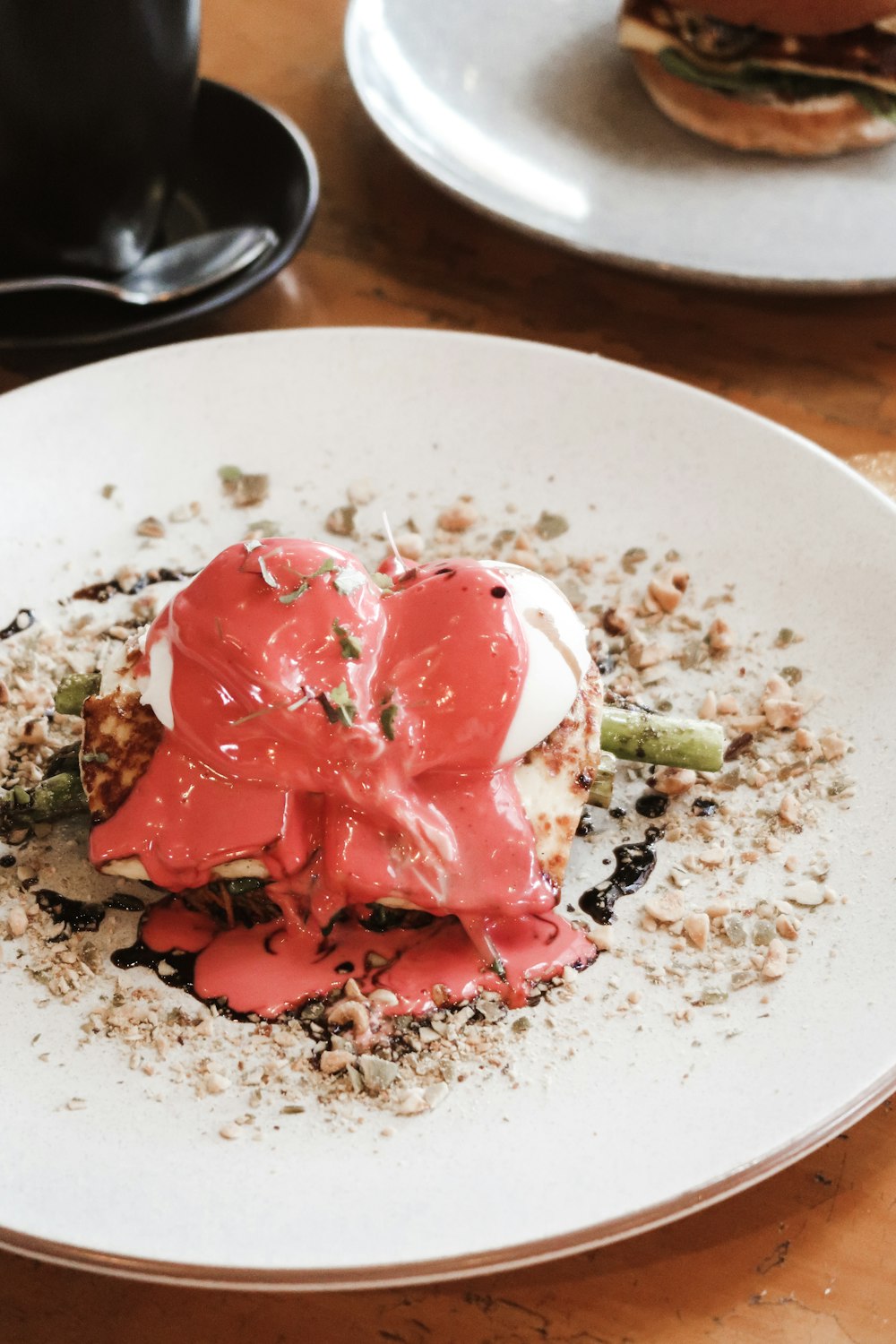 red and white ice cream on white ceramic plate