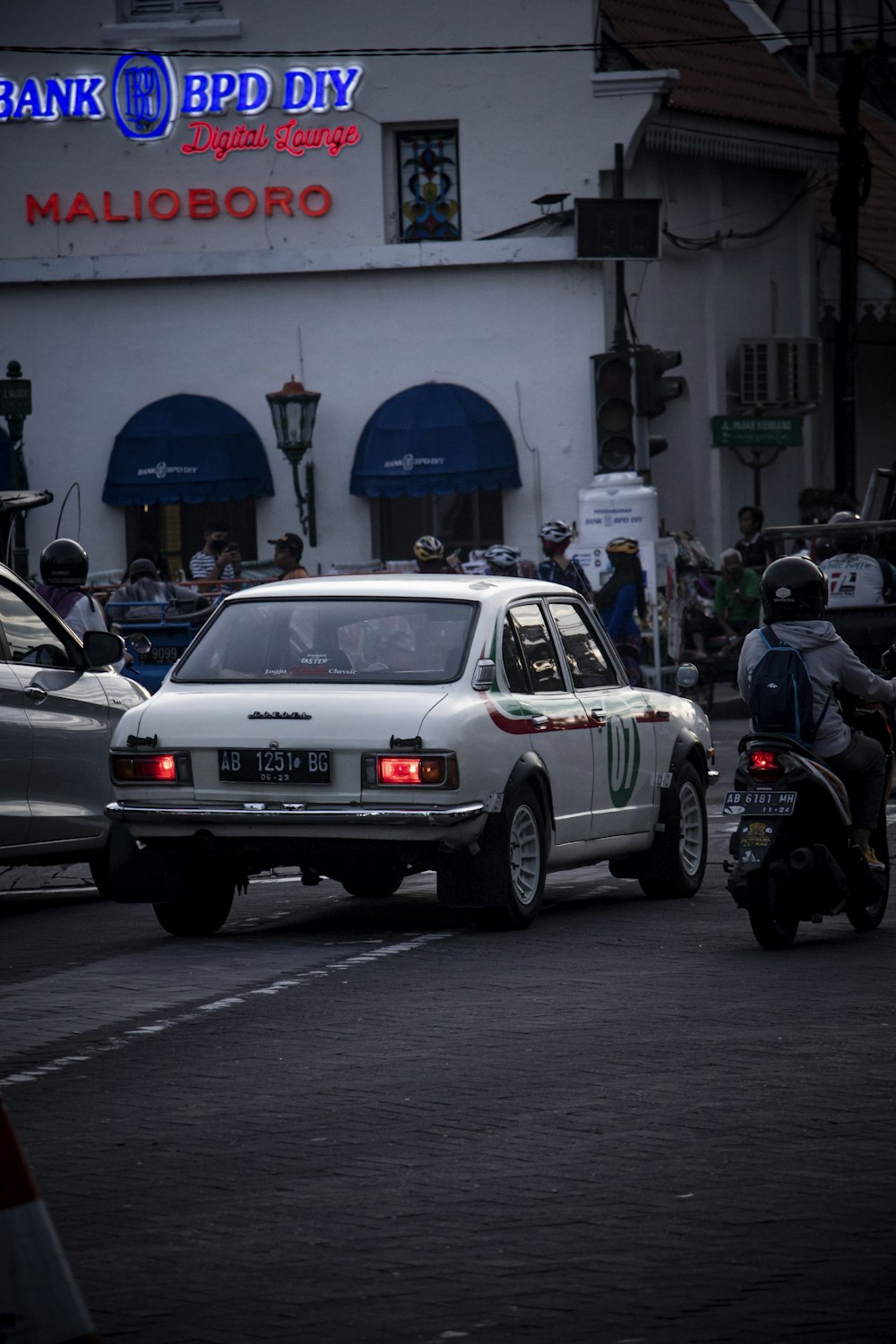 white and black police car on road during daytime