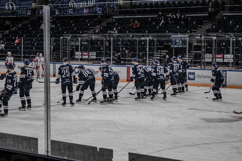 ice hockey players on ice hockey field