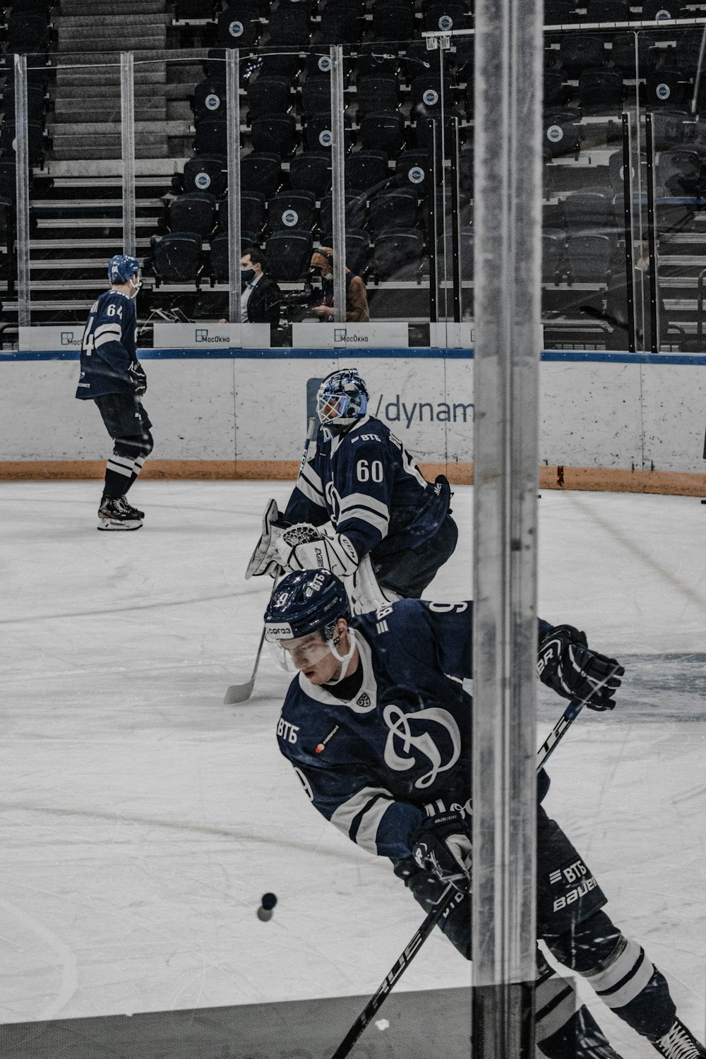 ice hockey players on ice hockey field