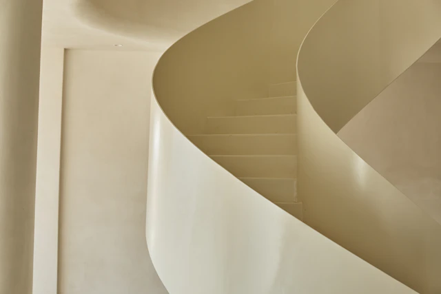 White spiral staircase seen from directly above