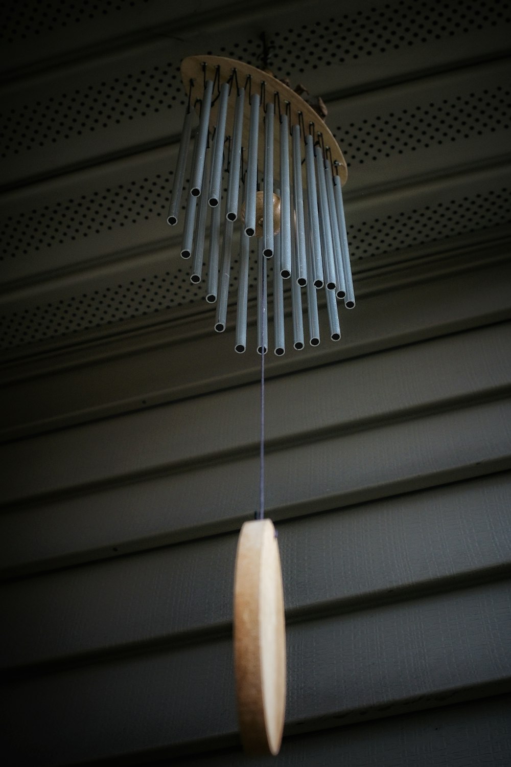 white and silver wind chime