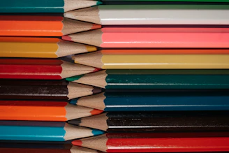 Close-up of a stack of assorted pens ready for bulk shipment.