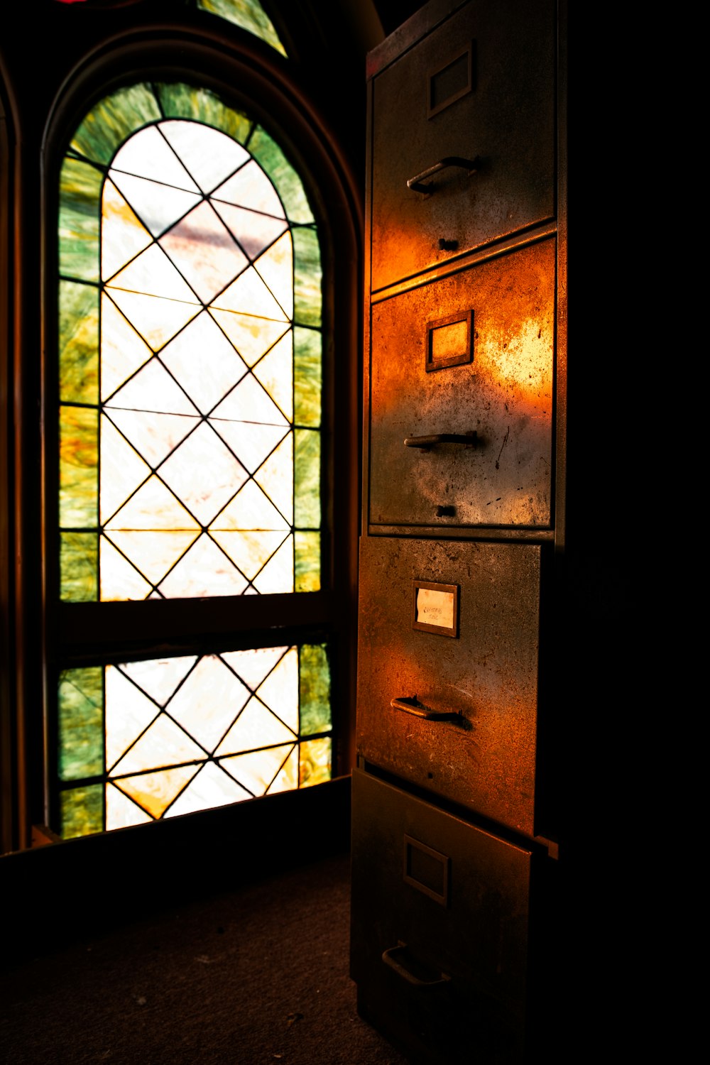 brown wooden framed glass window