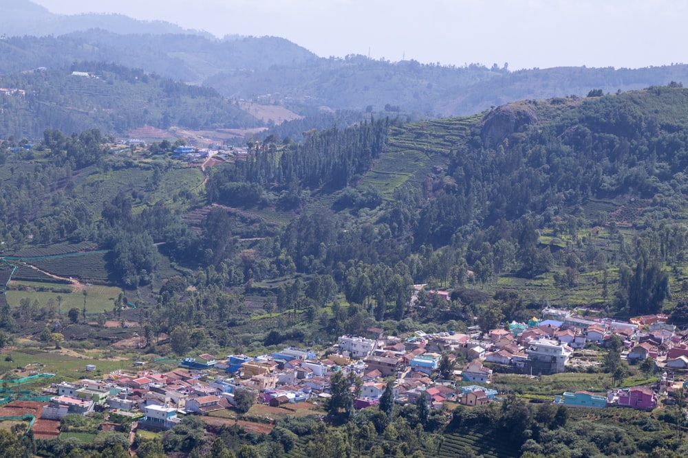 aerial view of houses on mountain during daytime