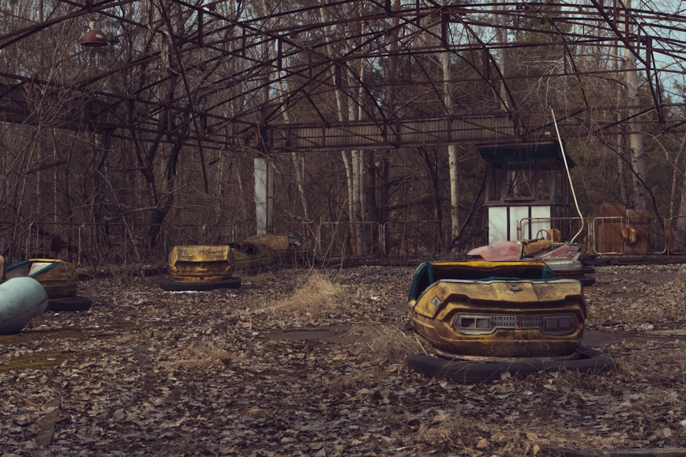 yellow car parked on brown dirt road