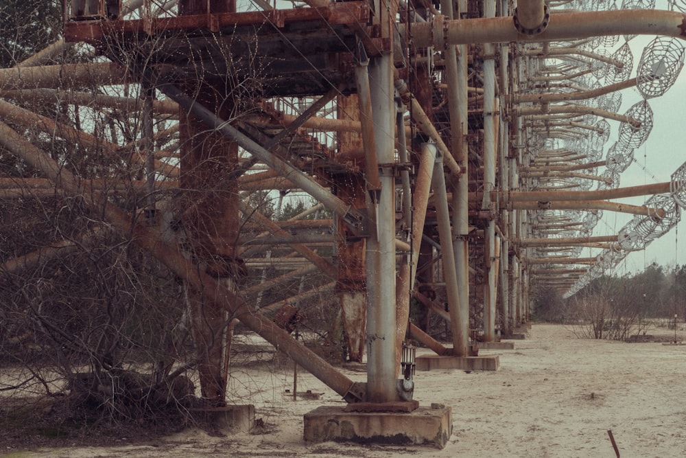 brown wooden bridge over body of water during daytime