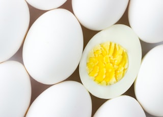 white egg lot on brown wooden table