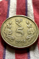 The 200 pesos Independence of Mexico coin showcasing historic symbols in fine silver.